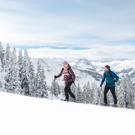 Snowshoe hike on the sunny side Kirchberg