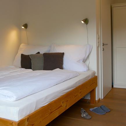 Ferienwohnung Rettenstein Schlafraum Bergblick im 