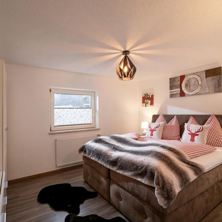 Haus_Milan_Weibernweg_2_St_Johann_Schlafzimmer_3