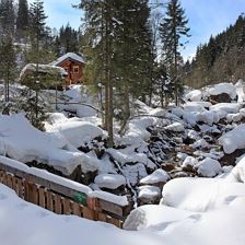 Rettensteinhuette_Winter_Bach