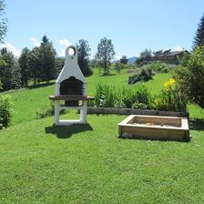 Grillecke mit Sandkasten
