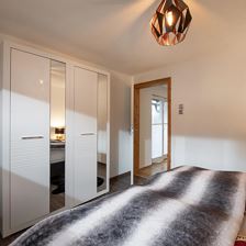 Haus_Milan_Weibernweg_2_St_Johann_Schlafzimmer_2