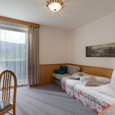Freihof_Holzham_108_Westendorf_05_2022_Zimmer_Sonn