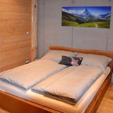 Schlafzimmer mit Doppelbett