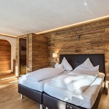 1-Raum Suite mit Infrarotkabine 42m²