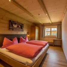 Appartementhaus Hinting Schlafzimmer Almrose
